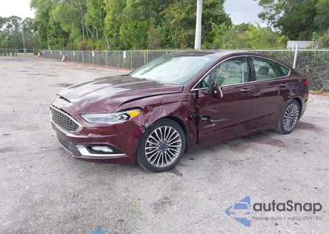 2017 Ford Fusion Hybrid Platinum z USA, uszkodzony, nr VIN 3FA6P0RU0HR309626